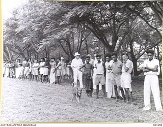 PORT MORESBY - NATIVE ONLOOKERS NEAR 100 YARDS LANES AT A.A.C. SPORTS. (NEGATIVE BY N. TRACY)
