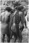 Men play panpipes to accompany the sango dance at Ngarinaasuru, probably 1977