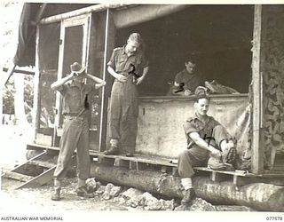 PERSONNEL OF THE 27TH INFANTRY BATTALION BEING ISSUED WITH NEW CLOTHES AT THE UNIT "Q" STORE. IDENTIFIED PERSONNEL ARE:- SX39882 LANCE-CORPORAL C.H. GREENING (1);SX28082 PRIVATE P.R. TAYLOR (2); ..