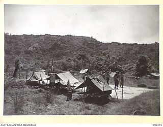 RABAUL, NEW BRITAIN, 1945-09-11. TEMPORARY CAMP ESTABLISHED BY HQ COMPANY, 37/52 INFANTRY BATTALION, ONE OF THE UNITS OF 4 INFANTRY BRIGADE WHICH OCCUPIED RABAUL AFTER THE JAPANESE SURRENDER