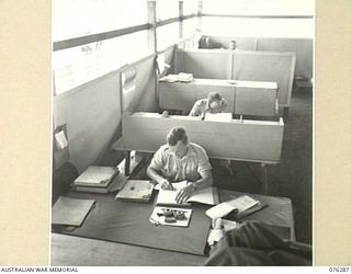 LAE, NEW GUINEA. 1944-09-27. A SECTION OF THE ORDERLY ROOM OF THE 43RD FIELD ORDNANCE DEPOT