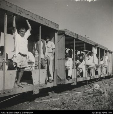 Workers riding the train