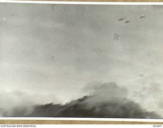 FARIA RIVER, NEW GUINEA. 1944-01-20. MITCHELL BOMBERS MOVING INTO ATTACK JAPANESE POSITIONS ACROSS MAIN CREEK