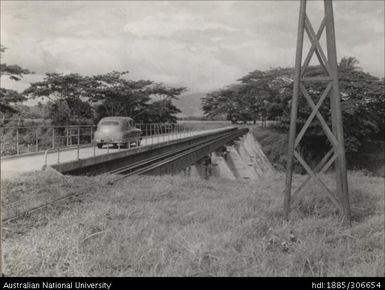 Car travelling over bridge