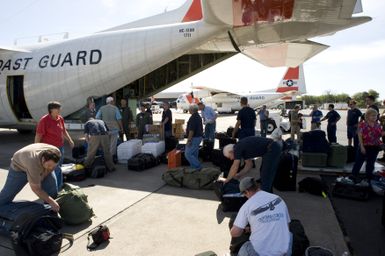 Earthquake ^ Tsunami - Barbers Point, Hawaii, September 30, 2009 -- Responders from FEMA and other federal agencies prepare to board a U. S. Coast Guard plane heading for American Samoa. FEMA is the lead federal agency in the response to the earthquake and tsunami disaster. FEMA/Casey Deshong