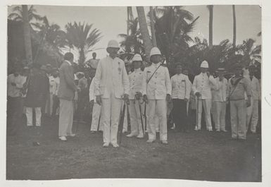 Group watching the hoisting of the flag after the reading of the proclamation of the annexation of Niue - Photograph taken by Malcolm Ross