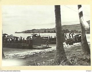 WANDOKAI, NEW GUINEA. 1944-04-22. TROOPS OF THE 101ST BRIGADE SUPPORT COMPANY WITH A 4.2 INCH MORTAR MOUNTED IN LCM'S (LANDING CRAFT MECHANIZED) DURING LANDING TRIALS. THE TRIALS WERE CONDUCTED BY ..