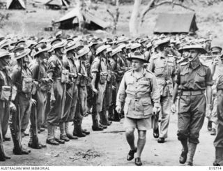 1943-09-15. NEW GUINEA. THE COMMANDER OF THE ALLIED LAND FORCES IN THE SOUTHWEST PACIFIC, GENERAL SIR THOMAS BLAMEY INSPECTS AUSTRALIAN TROOPS AT A NEW GUINEA BASE. (NEGATIVE BY H. DICK)