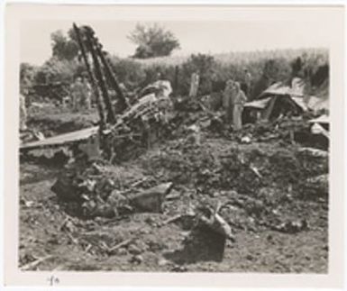 [Servicemen gathered around wreckage of unidentified aircraft, Saipan]