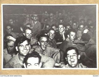 ELA BEACH, NEW GUINEA. 1943-12-21. PORTION OF A CROWD WHICH ATTENDED A CONCERT GIVEN BY MISS GLADYS MONCRIEFF AND PARTY OF ENTERTAINERS