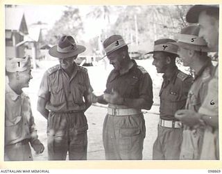 FAURO ISLAND, BOUGAINVILLE AREA. 1945-11-12. THE ATROCITIES COMMISSION ON FAURO ISLAND. IDENTIFIED PERSONNEL ARE:- SERGEANT J. TAKEHANA (1); CAPTAIN R.M. EWING (2); LIEUTENANT COLONEL W.G. FRY (3); ..