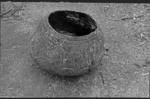 Decorated, unpainted cooking pot
