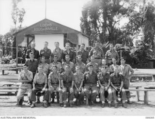 TOROKINA, BOUGAINVILLE, 1945-12-03. MEMBERS OF 1 DETACHMENT MOBILE CINEMA UNIT AT BOSLEY FIELD, WHICH WAS TAKEN OVER FROM THE AMERICANS AND IS THE LARGEST THEATRE AREA IN BOUGAINVILLE