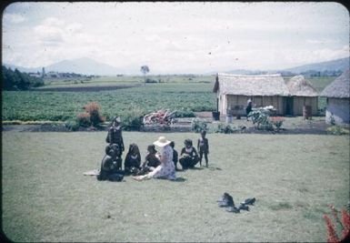 Doctor's wife buying vegetables in exchange for beads, salt, paper etc : Wahgi Valley, Papua New Guinea, 1954-1955 / Terence and Margaret Spencer