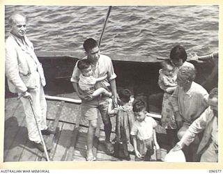 SORAKEN PENINSULA, BOUGAINVILLE. 1945-09-14. A MOTOR LAUNCH CARRYING MEMBERS OF HEADQUARTERS 2 CORPS, PREPARED FOR SURRENDER DISCUSSIONS WITH THE JAPANESE AT A SEA RENDEZVOUS OFF SORAKEN PENINSULA, ..