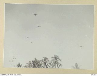 LABU, NEW GUINEA. 1944-10-03. DOUGLAS AIRCRAFT OF THE UNITED STATES ARMY AIR CORPS, TOWING GLIDERS LOADED WITH TROOPS