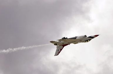 A U.S. Air Force Thunderbirds Aerial Demonstration Team F-16C Fighting Falcon aircraft performs an inverted flight maneuver during a performance for the Open House Air Show, Sept. 12, 2004, at Andersen Air Force Base, Guam. (U.S. Air Force PHOTO by STAFF SGT. Bennie J. Davis III) (Released)