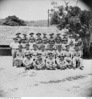 PORT MORESBY, NEW GUINEA. 1944-02-07. OFFICERS OF THE AUSTRALIAN NEW GUINEA ADMINISTRATIVE UNIT (ANGAU) HEADQUARTERS, WITH OFFICERS OF THE FIELD STAFF AT A SIX DAY CONFERENCE ON DISTRICT ..