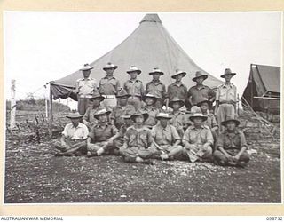 CAPE WOM, NEW GUINEA. 1945-11-14. A GROUP OF RESCUED CHINESE LABOURERS AT 6 DIVISION PROVOST COMPANY. THEY ARE NOW REGAINING THEIR FORMER HEALTH WITH GOOD FOOD AND MEDICAL TREATMENT AFTER THEIR ..