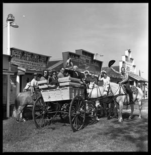 [Gov. Bill Daniel and Hank Williams, Jr. in Wagon]