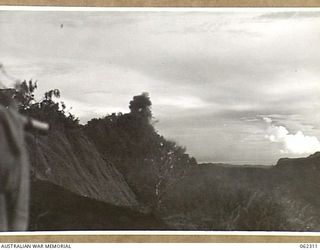 SHAGGY RIDGE, NEW GUINEA. 1943-12-27. 500 POUNDER BOMBS DROPPED FROM UNITED STATES ARMY FIGHTER AIRCRAFT EXPLODING ON JAPANESE POSITIONS ON THE "PIMPLE" DURING THE 2/16TH AUSTRALIAN INFANTRY ..