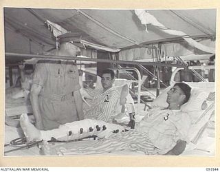 TOROKINA, BOUGAINVILLE. 1945-07-03. HIS ROYAL HIGHNESS, THE DUKE OF GLOUCESTER, GOVERNOR-GENERAL OF AUSTRALIA (1), VISITING PATIENTS AT 2/1 GENERAL HOSPITAL