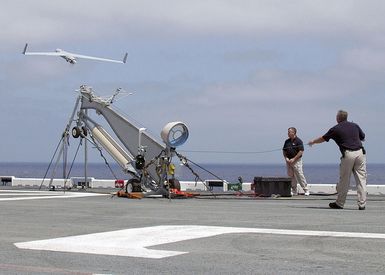 An unmanned aerial vehicle (UAV) called the"Scan Eagle"launches from a pneumatic wedge catapult launcher on the flight deck of the U.S. Navy Tarawa Class Amphibious Assault Ship USS SAIPAN (LHA 2) during operations in the Atlantic Ocean on Aug. 23, 2006. The"Scan Eagle"is designed to provide persistent intelligence, surveillance and reconnaissance data, battle damage assessment and communications relay in support of the Global War On Terrorism. (U.S. Navy photo by Mass Communication SPECIALIST SEAMAN Patrick W. Mullen III) (Released)