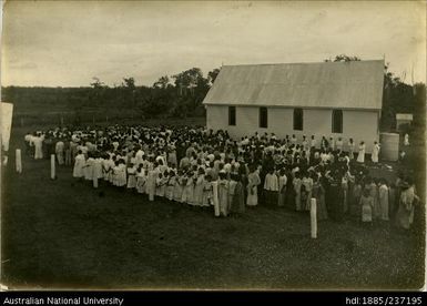 Natives of Western Division attending the opening of the first church built at Daru