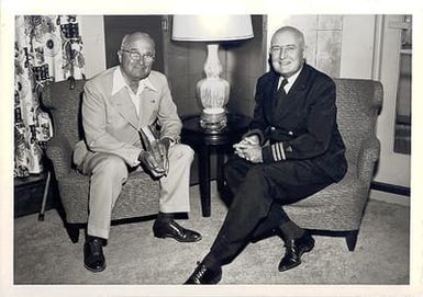 Truman Holding Book "Prince Of Players" With Officer In Hawaii