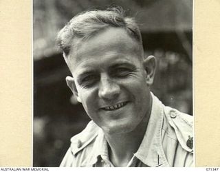 KILIGIA, NEW GUINEA, 1944-03-16. VX54 MAJOR L.G. PARKINSON, BRIGADE MAJOR, HEADQUARTERS, ROYAL AUSTRALIAN ARTILLERY, 5TH DIVISION