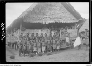 POPONDETTA, NEW GUINEA, 1945-07-02. A GROUP OF JUVENILE PATIENTS OUTSIDE A WARD OF THE ANGAU NATIVE HOSPITAL. THEY ARE MAINLY SUFFERING FROM MALARIA WHICH IS INCIDENT AMONG THE NATIVES. NOTE THE ..