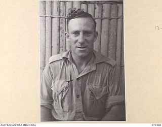 MILNE BAY, NEW GUINEA, 1944-01-11. NX94082 SERGEANT D.M. COOK, DETACHMENT Z FIELD SECURITY SECTION, ATTACHED TO THE MILNE BAY BASE SUB AREA