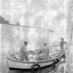 Group in clinker boat