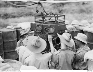 LAE, NEW GUINEA, 1944-03-26. MEMBERS OF C TROOP, PREDICTOR DETACHMENT, 2/6TH HEAVY ANTI-AIRCRAFT BATTERY, MANNING A VICKERS PREDICTOR NO. 1 MKIII, (WITH HEIGHT COMPUTER), AT THE 2/3RD ANTI-AIRCRAFT ..