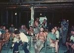 Beer and movie at the Back and Atom Club, Bikini Island, during Capricorn Expedition. November 4, 1952. Front: Willard Bascom, John MacFall, Walter Munk. Middle: Martin Johnson, Buddy King