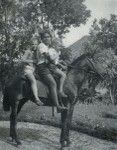 Missionary children going to school on horseback