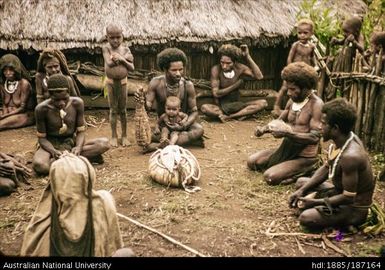 Group sitting around a bundle