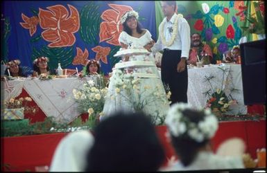 Bride and groom cutting cake, Rarotongan wedding