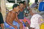 Men in audience at party, Sialeva