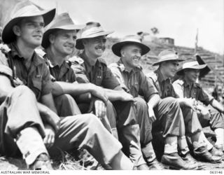 DONADABU, PAPUA, NEW GUINEA. 1944-01-01. PERSONNEL OF 58/59TH INFANTRY BATTALION WHO WERE DECORATED DURING THE BOBDUBI- SALAMAUA CAMPAIGN, PHOTOGRAPHED AT THE 15TH INFANTRY BRIGADE GYMKHANA. THEY ..