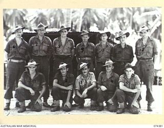 SIAR, NEW GUINEA. 1944-06-27. PERSONNEL OF THE TRANSPORT SECTION, HEADQUARTERS, 15TH INFANTRY BRIGADE. IDENTIFIED PERSONNEL ARE:- VX122089 DRIVER B. CUNNINGHAM (1); VX114289 DRIVER F.D. BROWN (2); ..