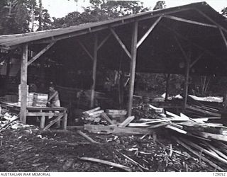 LAE, NEW GUINEA. 1945-12. SAW MILL AT 4TH ADVANCED ORDNANCE DEPOT. (DONOR: J. W. K. BEDDOME)