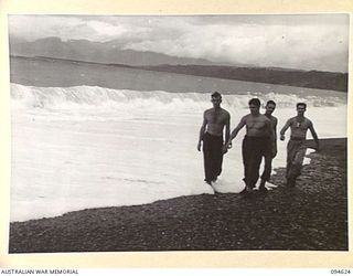 LAMARIEN, HENRY REID BAY, NEW BRITAIN, 1945-07-28. HUGE BREAKERS POUNDING THE BEACH NEAR THE CAMP OF THE 2/2 COMMANDO SQUADRON