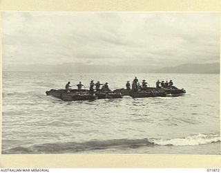 LAE, NEW GUINEA. 1944-03-30. DUKWS (LANDING CRAFT MECANIZED), OF AMPHIBIOUS PLATOON, 151ST GENERAL TRANSPORT COMPANY RETURNING TO THE PLATOON AREA AFTER COMPLETING A TEST RUN TO CHECK MAINTENANCE. ..