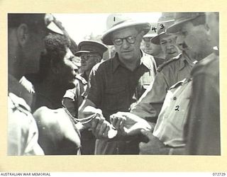 DOBODURA, NEW GUINEA. 1944-04-23. THE HONOURABLE E.J. WARD, MINISTER FOR EXTERNAL TERRITORIES IN THE AUSTRALIAN GOVERNMENT (1), WITH PX134 MAJOR S. ELLIOTT-SMITH, AUSTRALIAN NEW GUINEA ..