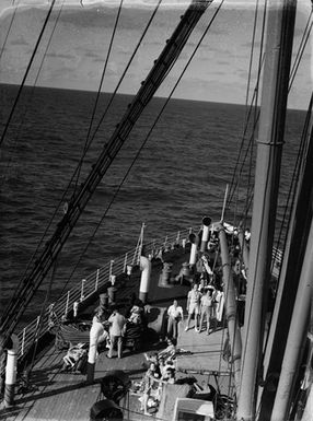 [People on the foredeck of a cruise ship]