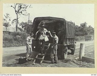 LAE, NEW GUINEA, 1945-05-07. A GROUP OF 342 AUSTRALIAN WOMEN'S ARMY SERVICE BROUGHT FROM AUSTRALIA BY MV DUNTROON, ARRIVED IN LAE TO TAKE UP VARIOUS APPOINTMENTS. HERE THE FIRST TRUCK OF AUSTRALIAN ..