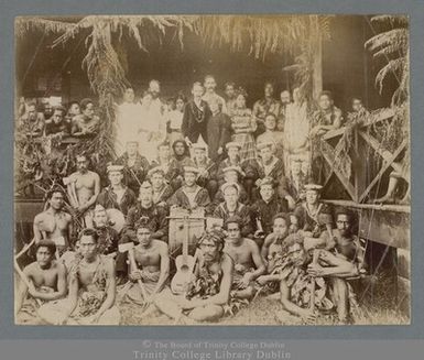 Souvenir photograph of Robert Louis Stevenson, his family, Samoans and a group of British sailors, Vailima, Samoa