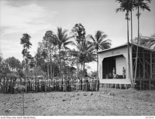 LAE, NEW GUINEA. 1944-06-07. THE CONGREGATION AT A SPECIAL SERVICE HELD FOR THE INVASION OF FRANCE AT THE NEW GUINEA FORCE CINEMA, HEADQUARTERS NEW GUINEA FORCE. IDENTIFIED PERSONNEL ARE:- NX156703 ..