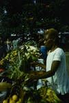 Tolai woman selling fruits and vegetables at Rabaul market